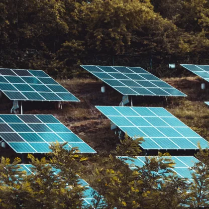 Solar panels reflecting blue sky